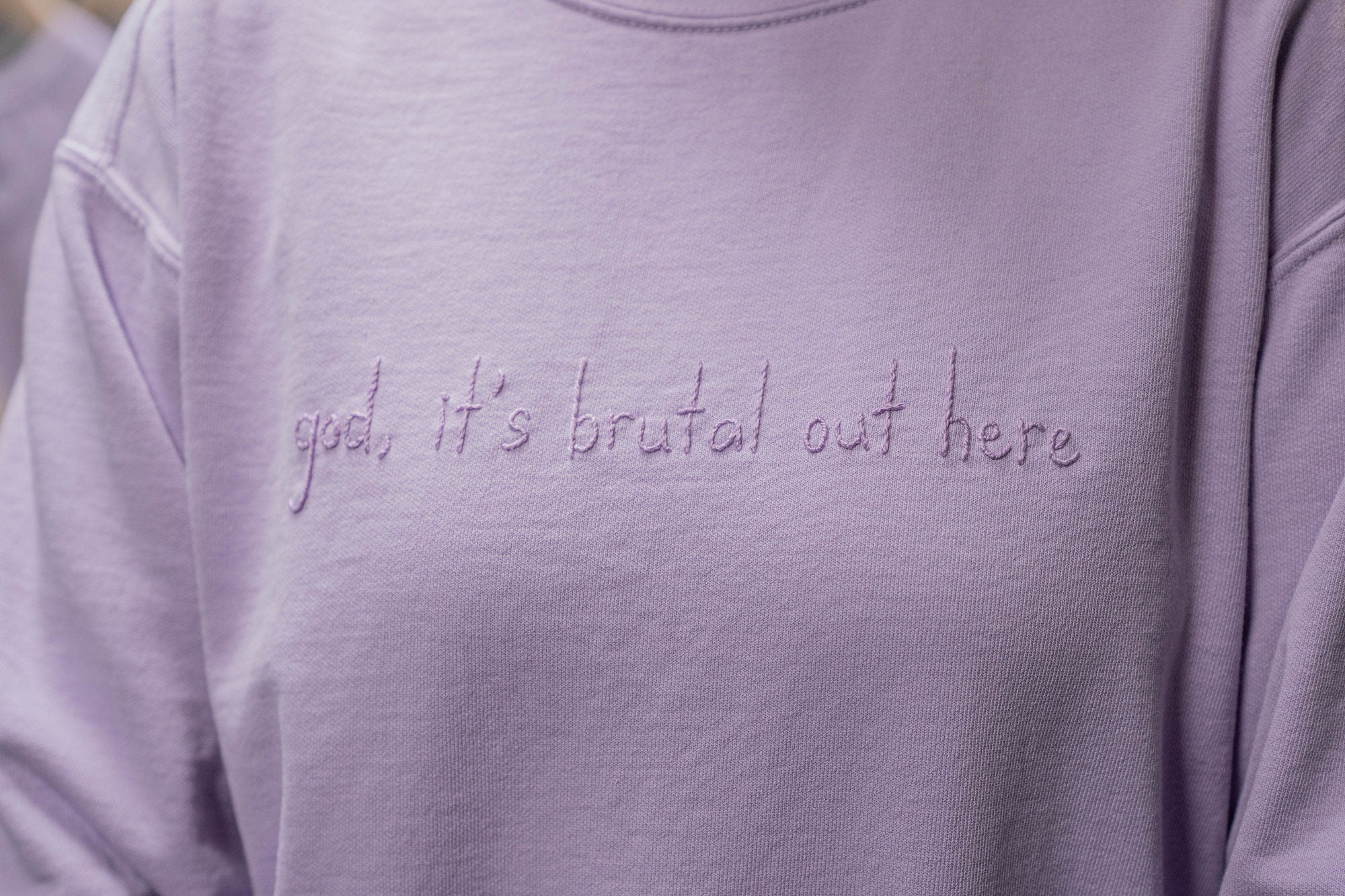God, It’s Brutal Out HereHand Embroidered Sweatshirt